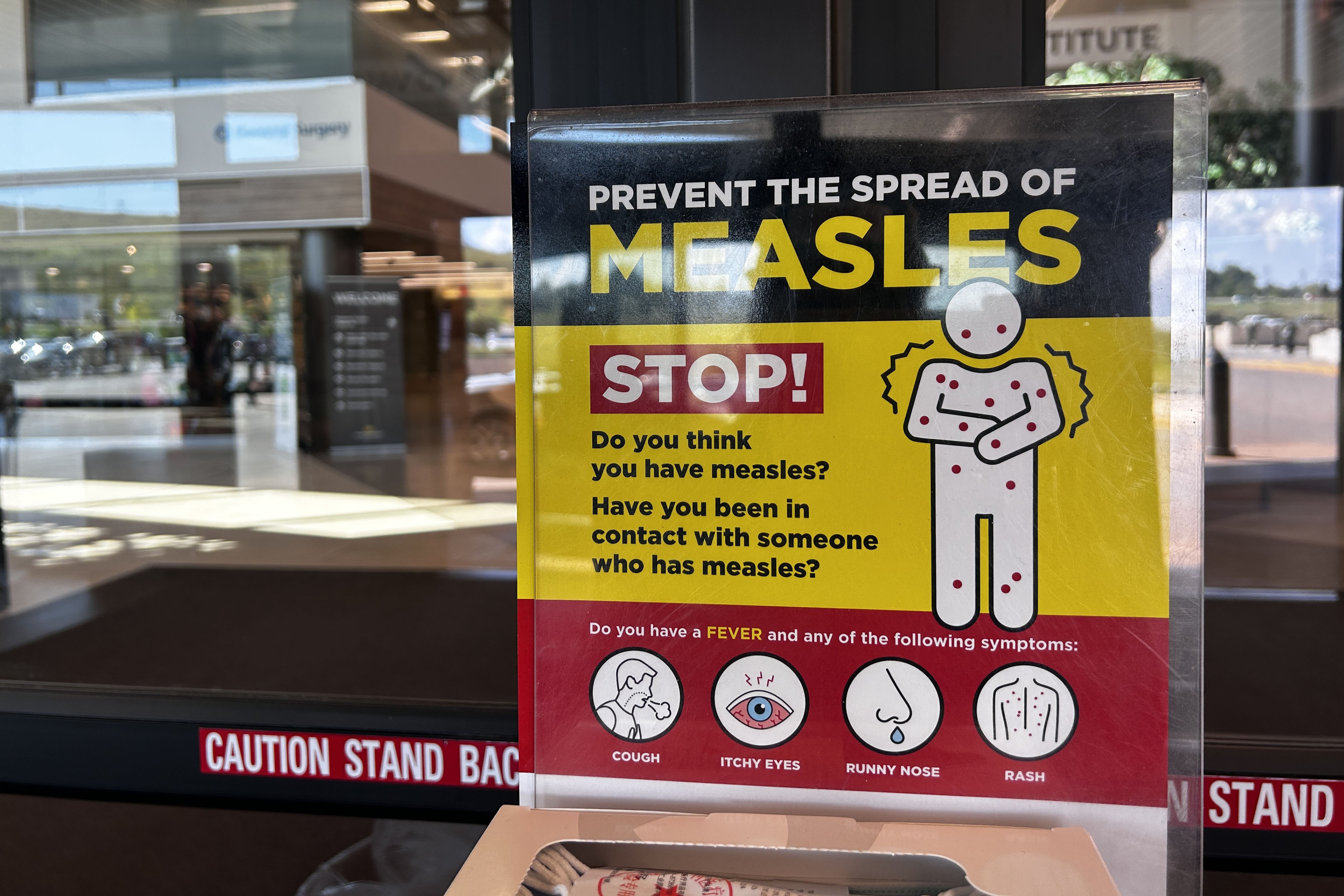 A photo of an infographic that explains measles symptoms.